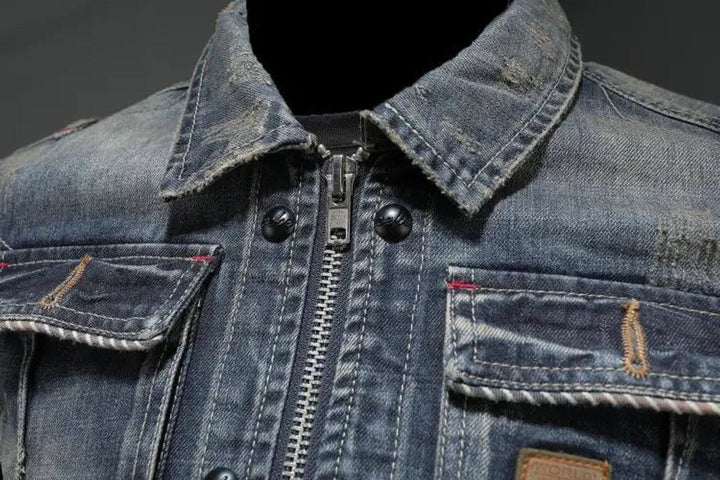 Close-up of Callahan denim jacket zipper and chest pockets
