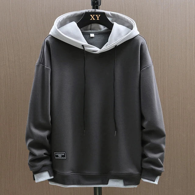 Dashiell two-tone pullover hoodie in dark gray and light gray, front view