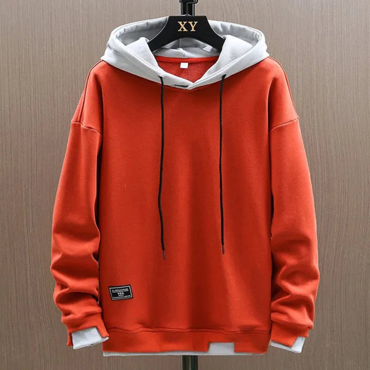Dashiell two-tone pullover hoodie in orange and gray, front view