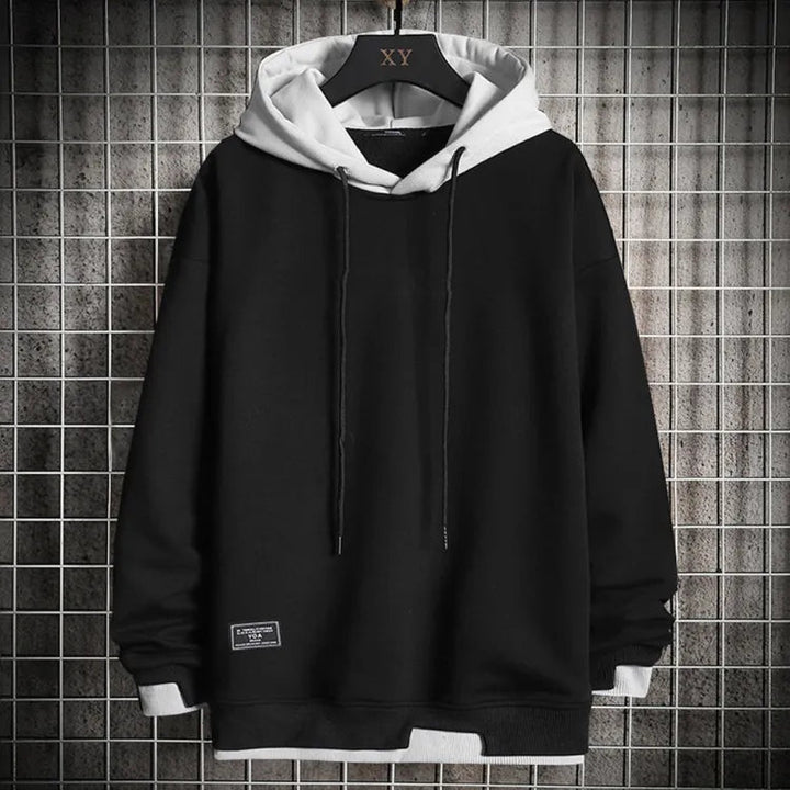 Dashiell two-tone pullover hoodie in black and white, front view