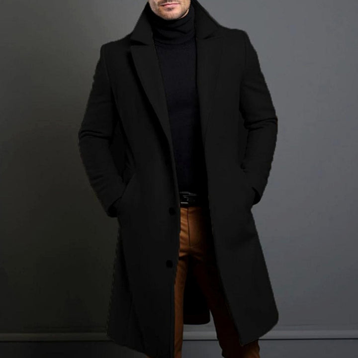 Desmond black tailored long overcoat with notched lapel, front view