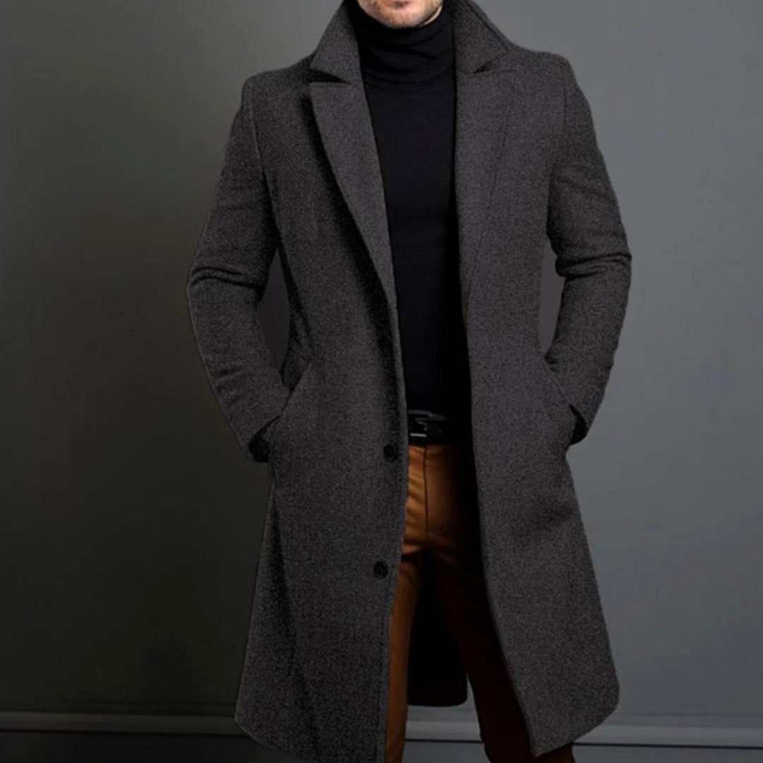 Desmond charcoal grey tailored long overcoat with notched lapel, front view