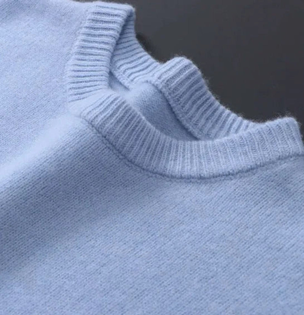 Close-up of Julian's ribbed crew neckline detail