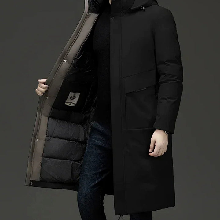 Marcus hooded long puffer winter coat in black, side view with open zip front