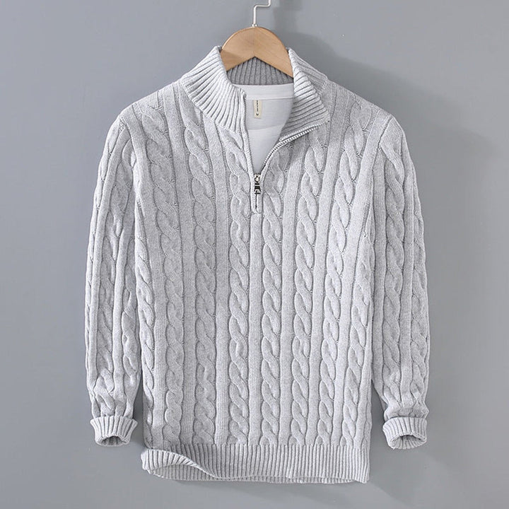 Sebastian cable knit quarter zip sweater in gray, front view on hanger