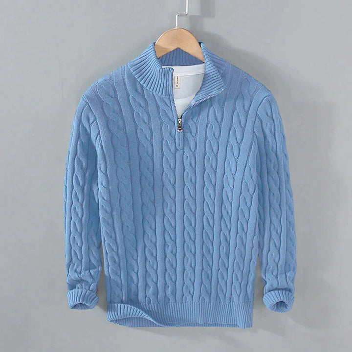 Sebastian cable knit quarter zip sweater in light blue, front view on hanger